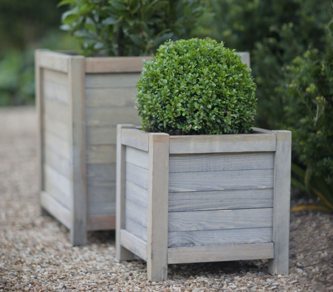 Вазоны для цветов уличные - бетонные, керамические, деревянные, каменные. Советы по использованию. Фото.